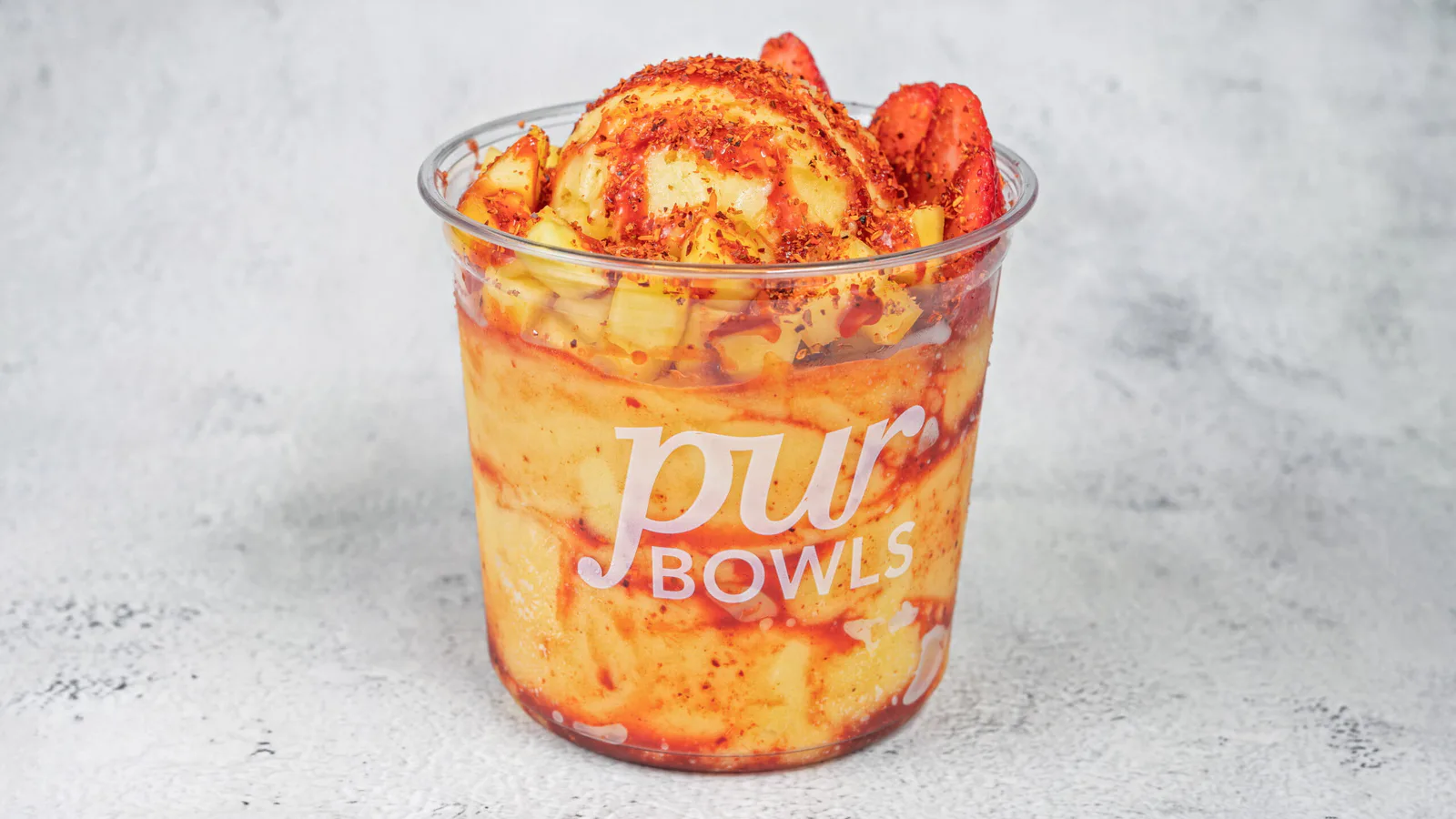 Mango Chamoy Bowl with fruit, chamoy, and Tajin seasoning
